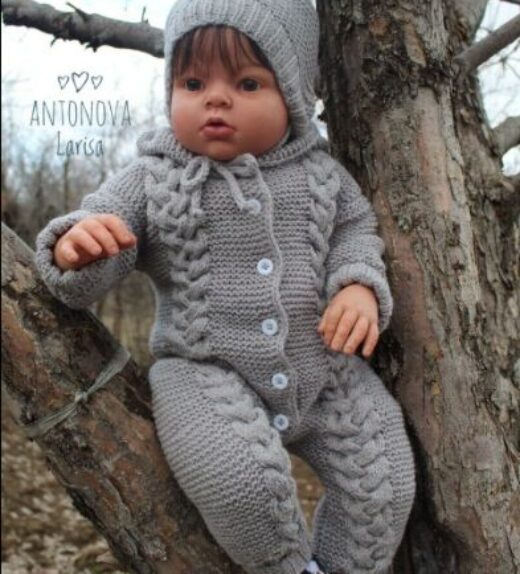 Reborn doll clothes - Reborn baby in knitted grey baby outfit sitting on the tree