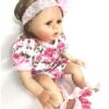 Reborn doll clothes - Sitting reborn girl in pink rose pattern bodysuit